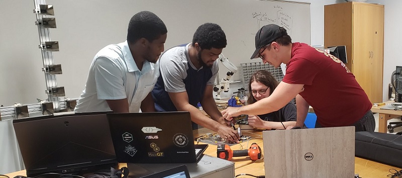 Working on the electronics box.