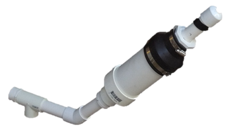 The PVC exhuast fitting. This component contains the filter and the condensation drain