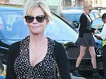Picture Shows: Melanie Griffith  October 20, 2014
 
 ** Min Web / Online Fee   150 For Set **
 
 'Automata' star Melanie Griffith receives a parking ticket in Los Angeles, California. The actress was saying goodbye to a friend as a traffic officer wrote her a ticket.
 
 ** Min Web / Online Fee   150 For Set **
 
 Exclusive All Rounder
 UK RIGHTS ONLY
 
 Pictures by : FameFlynet UK    2014
 Tel : +44 (0)20 3551 5049
 Email : info@fameflynet.uk.com