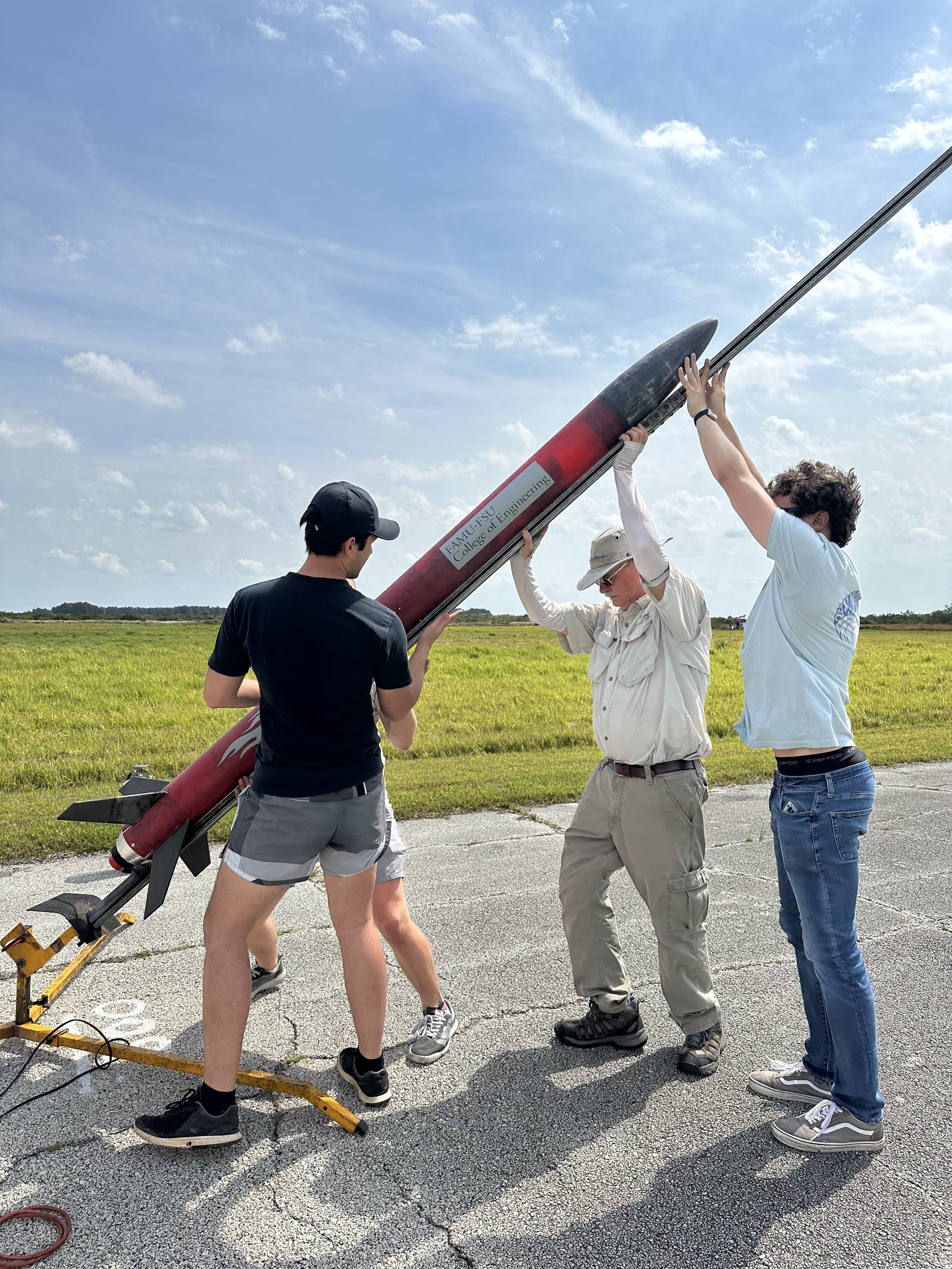 Team preparing the rocket before launch